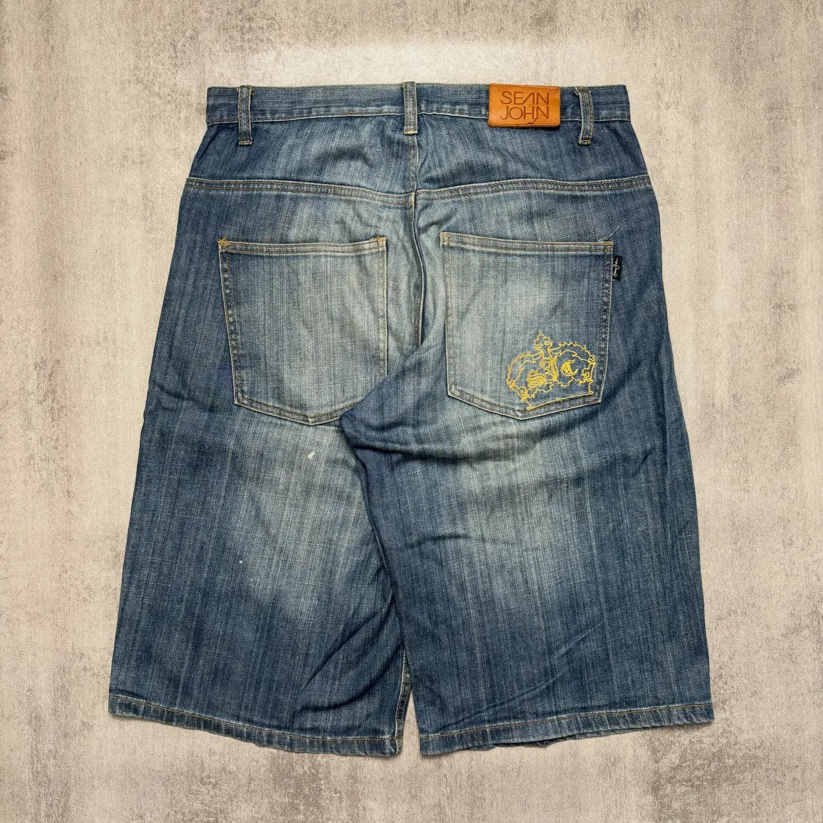 SEAN JOHN SCRIPT EMBROIDERY JORTS detail view